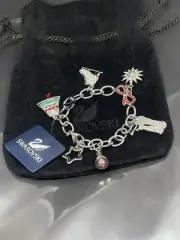 VTG Swarovski Rockefeller Center 2005 Silvertone Christmas 6 Charms Bracelet NWT