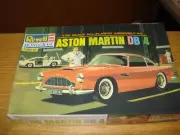 NEW ASTON MARTIN DB 4 MODEL 1/25 SCALE REVELL MONOGRAM ALL PLASTIC ASSEMBLY KIT