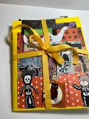 HALLOWEEN folio with ephemera pockets stuffed with junk journal supplies
