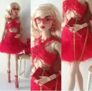 6 Pcs Outfit Top, Skirt , Boots,Sung,Bag,Brac,Doll And Other Access Are Not Inc