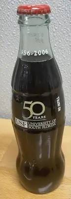 University of South Florida 50 Year Commemorative Coca Cola Bottle. Unopened.