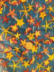 Blue with sea horses and sea shells cotton quilting fabric