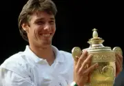 Michael Stich of Germany with the trophy after defeating Boris Bec- Old Photo