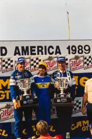 Chip Robinson and Geoff Brabham on the podium during the Road Amer- Old Photo