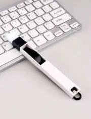 Keyboard cleaning brush, desk accessory.