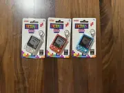 SUPREME/TETRIS MINI LCD Rechargeable Handheld Game Device Keychain Complete Set