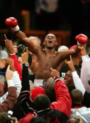 Jermain Taylor celebrates his unanimous-decision victory over Bern - Old Photo