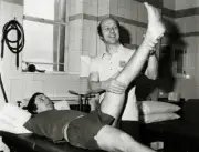 Arsenal physio Fred Street with Richie Powling on the treatment ta- Old Photo