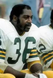 MacArthur Lane Green Bay Packers watches the action from the benc- 1974 Photo