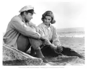 Audie Murphy sitting on the beach with Patricia Owens The Gun Runn- Old Photo