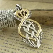 Sterling Silver & 10K Celtic Heron Pendant with White Topaz Keith Jack Boxed