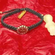 NWOT black and gold religious cross bracelet~Blessed~Baby Jesus~Glows in dark