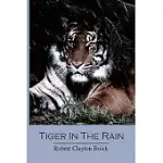 TIGER IN THE RAIN