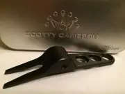 Black Titleist Scotty Cameron Divot Tool - pitch repairer in metal tin