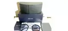 Prada unisex sunglasses spr 56x round lenses black frame made in Italy