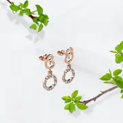 Rose Gold Twisted Knot Dangle Earrings Embellished With SWAROVSKI® Crystals