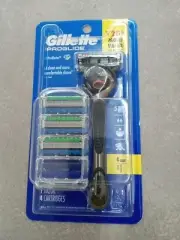 GILLETTE PROGLIDE RAZOR HANDLE PLUS 4 CARTRIDGES BRAND NEW GENUINE GILLETTE SET