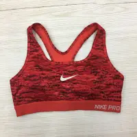 在飛比找Yahoo!奇摩拍賣優惠-【愛莎＆嵐】 NIKE 女 紅色圖騰造型品牌圖繪運動背心/S