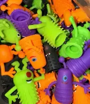 50 Finger Puppets Toys Funny Colorful Monster Stretchy Finger Puppets New