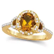 Oval Citrine and 0.25 CT. T.W. Natural Diamond Frame Buckle Ring in Solid 10K Yellow Gold