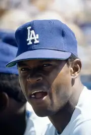 Manny Mota Los Angeles Dodgers looks on at a Major League Basebal- 1976 Photo