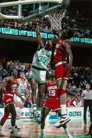 Reggie Lewis Boston Celtics shoots v Hakeem Olajuwon Houston Rocke- Old Photo
