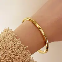 在飛比找momo購物網優惠-【CReAM】Sylvia鍍18K金色銀色扭結簡約手鐲手環(