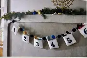 New In Box Navy Christmas Garland With 8 Drawstring Bags