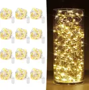 Paquete de 12 luces de hadas con pilas de 7 pies y 20 mini luces LED de cadena