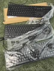 Lot of 3 different Dell Keyboards still in plastic, new. Free Shipping!