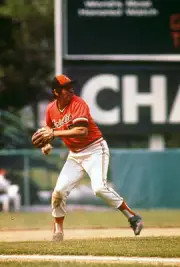 Brooks Robinson Baltimore Orioles looks to make a throw to first b- Old Photo