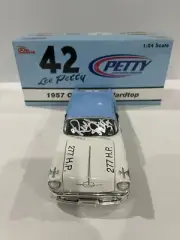 #42 Lee Petty 1957 Oldsmobile Hardtop. AUTOGRAPHED By Richard Petty
