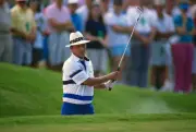 Golfer Juan Chi Chi Rodriguez swings and watches his shot duri- Golf 1988 Photo