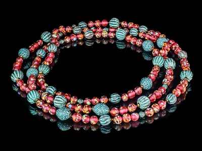 A Long Necklace of Tombo Japanese Glass in Burgundy-Red and Teal CRBM 10007