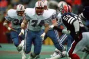 Offensive lineman Bruce Matthews Houston Oilers blocks against the- Old Photo