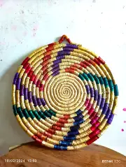 Handmade straw plate made from wheat ears for everyday use and decoration