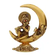 Golden Metal Handcrafted Lord Krishna Idol Playing Flute and Sitting On Half Moo