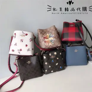 北美精品代購 COACH 6835 Mini 蔻馳新款 小號水桶包 字母印花小花朵單肩斜挎側背桶包 附購證