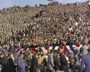 President John F. Kennedy sits in crowd at 1961 Army-Navy Game New 8x10 Photo