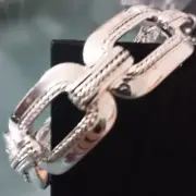 NAPIER Mod/Contemporary Shiny Silver Smooth & Twisted Texture Stretch Bracelet