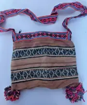 Peruvian chuspa woven in multicolored sheep wool Andean community