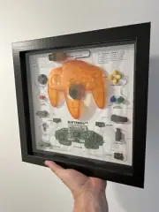 Nintendo N64 Controller Orange Original Teardown Wall Frame