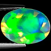 1.32 Ct Natural Ethiopian Faceted Opal Gemstone Multi Color Oval Faceted Cut