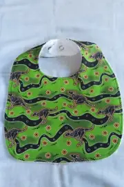 Handmade bib- Indigenous print on green