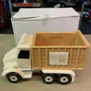Aunt Beth's Cookie Keepers Brown Roll off Truck Consolidated Fabricators Corp