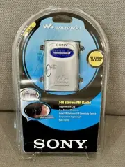 Sony SRF-59 AM/FM Walkman Radio Silver with Headphones & Belt Clip - NEW!!