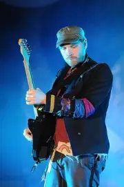 Guitarist Jonny Buckland of Coldplay performs on day three of the - Old Photo 1