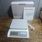 digital kitchen scale with a capacity of 6000g and an accuracy of 0.1g. It is