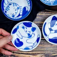 在飛比找ETMall東森購物網優惠-日本進口卡通小盤日式餐具陶瓷碗可愛貓咪圖案小碟家用網紅餐具