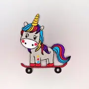 Unicorn Skateboarding Patch — Iron On Badge Embroidered Motif — Cool Fun Colours